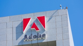 Adobe zyskuje 21,51 mld USD w 2024, ale prognozy na 2025 niepokoją inwestorów